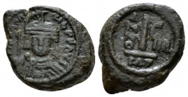 Maurice Tiberius, 582-602 Dencanummo Catania 590-591 (year 9), Æ 18.5mm., 4.63g. Helmetd and cuirassed facing bust, holding globus cruciger. Rev. Larg...
