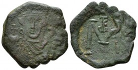 Constans II, 641-668 Follis Siracusa 644-647, Æ 23mm., 4.89g. Bearded bust facing, wearing crown and clamys, holding globus cruciger in r. hand. Rev. ...