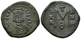 Theophilus, 829-842 Follis Siracusa 830-842, Æ 25.5mm., 6.07g. Bsu facing with short beard, wearing crown and clamys and holding globus cruciger. Rev....