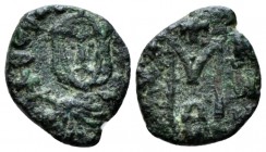 Theophilus, 829-842 Follis Siracusa 830-842, Æ 13mm., 1.23g. Bsu facing with short beard, wearing crown and clamys and holding globus cruciger. Rev. L...
