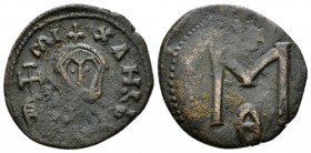 Michael III, 842-867 Follis Siracusa 842-866, Æ 21mm., 3.51g. Facing bus of Micahel wearing crown and loros and holding cross potent. Rev. Large M; ab...
