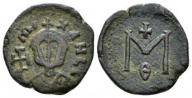 Michael III, 842-867 Follis Siracusa 842-866, Æ 18mm., 2.63g. Facing bus of Micahel wearing crown and loros and holding cross potent. Rev. Large M; ab...