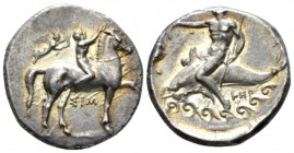 Calabria, Tarentum Nomos 330-325, AR 22mm., 7.69g. Jockey r., crowning his horse. Rev. Dolphin rider l. Fischer-Bossert 778. Historia Numorum Italy 88...