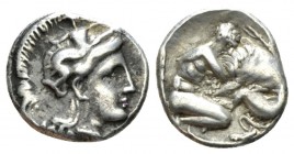 Calabria, Tarentum Diobol circa 325-280, AR 12mm., 1.12g. Head of Athena r., wearing Attic helmet. Rev. Herakles knelling r., strangling Nemean lion. ...
