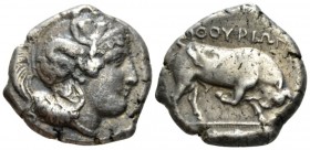 Lucania, Thurium Dinomos circa 400-350, AR 25mm., 15.84g. Head of Athena r., wearing crested Attic helmet decorated with Scylla. Rev. Bull butting r.;...
