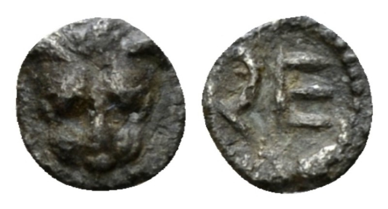 Bruttium, Rhegium Hexas circa 450-445, AR 7mm., 0.08g. Lion mask. Rev. RE. SNG A...