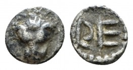 Bruttium, Rhegium Hexas circa 450-420, AR 6mm., 0.10g. Facing lion's head. Rev. RE. Herzfelder pl. VI, G. SNG ANS 656. Historia Numorum Italy 2493

...