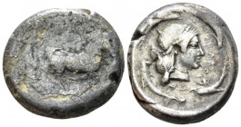 Sicily, Syracuse Tetradrachm circa 475-470, AR 24mm., 17.21g. Charioteer driving quadriga r.; above, Nike flying r., crowning horses. Rev. Diademed he...