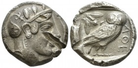 Attica, Athens Tetradrachm circa 455-450, AR 25mm., 16.65g. Head of Athena r., wearing crested Attic helmet, decorated with three olive leaves and pal...