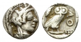 Attica, Athens Hemiobol after 449, AR 8mm., 0.33g. Head of Athena r., wearing Attic helmet decorated with olive leaves and palmette. Rev. Owl standing...