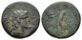 Corinthia, Corinth Claudius, 41-54 Semis circa 50-51, Æ 16mm., 3.01g. Draped and radiate bust of Helios r. Rev. Naked Poseidon standing l., holding do...