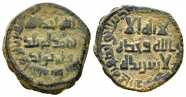 Arab-Byzantine. Umayyed Dynasty. Follis Jund Al-Urdunn, Nysa Scythopolis (Beisan), 670-690, Æ 26.5mm., 4.96g. On sides of figures of Justin II and Sop...