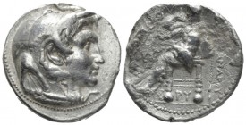 The Ptolemies, Ptolemy I as satrap, 323-305 Menphis or Alexandria Tetradrachm circa 321-317, AR 26mm., 14.39g. Head of Alexander r., wearing elephant'...