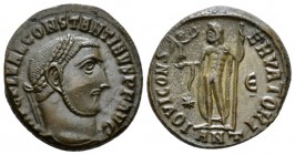 Constantine I, 307-337 Follis Antiochia circa 312, Æ 17mm., 5.3g. Laureate head r. Rev. Jupiter standing l., holding sceptre and Victory on globe: in ...