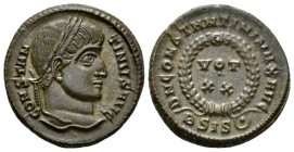 Constantine I, 307-337 Follis Siscia circa 321-324, Æ 18mm., 3.08g. Laureate head r. Rev. VOT/ XX in two lines within wreath; ASIS(pellet in crescent)...