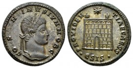 Constantine II caesar, 316-337. Follis circa 324-325, Æ 18mm., 3.38g. Laureate head r. Rev. Campgate with star above; below, •ESIS•. RIC 202.

Extre...