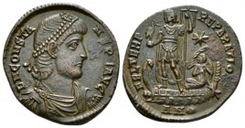 Constans, 337-350 Follis Antioch circa 337-340, Æ 22mm., 5.17g. Pearl-diademed, draped and cuirassed bust r. Rev. Constans standing l. on galley, hold...