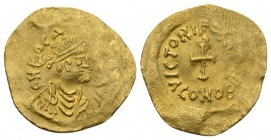 Phocas, 602-610. Tremissis Constantinopolis circa 607-610, AV 18mm., 1.49g. Diademed and draped bust r. Rev. Cross potent. DO 19. Sear 634.

Very Fi...