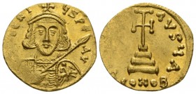 Tiberius III, 698-705. Solidus Constantinopolis 698-705, AV 19mm., 4.36g. Crowned and cuirassed facing bust, holding spear in r. hand and shield decor...