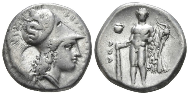 Lucania, Heraclea Nomos circa 340-330, AR 21mm., 7.80g. Head of Athena r., weari...