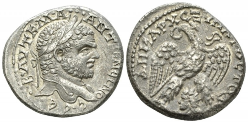 Caracalla, 198-217 Tetradrachm Emesa circa 215-217, AR 27.4mm., 14.75g. Laureate...