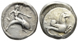Calabria, Tarentum Nomos circa 510-450, AR 19mm., 7.52g. Oecist riding dolphin r., holding octopus and extending l. hand. Rev. Hippocamp r.; below, sh...
