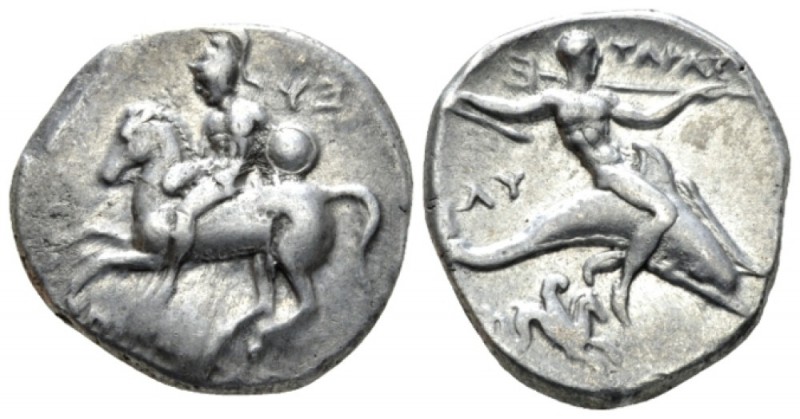 Calabria, Tarentum Nomos circa 302-280, AR 23.5mm., 7.80g. Helmeted horseman l.,...