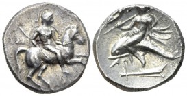 Calabria, Tarentum Nomos circa 272-240, AR 19mm., 6.49g. Horseman r., holding spear and shield. Rev. Dolphin rider l., holding spear: above, Nike crow...