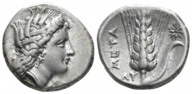 Lucania, Metapontum Nomos circa 330-290, AR 21mm., 7.77g. Head of Demeter r., wearing barley wreath; in front EY. Rev. Ear of barley with leaf r., on ...