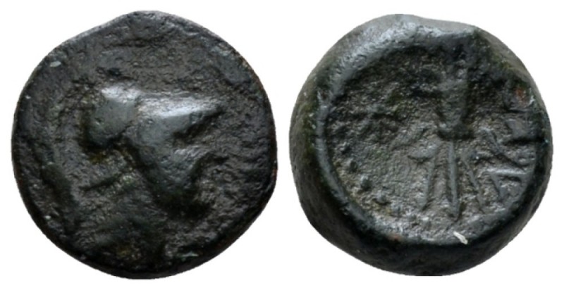 Bruttium, Locri Bronze circa 320-275, Æ 12.5mm., 1.93g. Head of Athena r., weari...