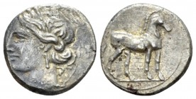 Bruttium, Locri (The Carthaginians in Italy) Quarter of sheke circa 215-205, AR 13.5mm., 1.80g. Head of Tanit-Demeter l., wearing barley wreath. Rev. ...