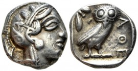 Attica, Athens Tetradrachm circa 365-359, AR 22.7mm., 17.10g. Head of Athena r., wearing crested helmet decorated with olive leaves and spiral palmett...