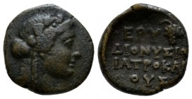 Ionia, Erythrai Bronze circa 300-200 BC, Æ 14mm., 2.90g. Wreathed head of Dionysos r. Rev. EPY / ΔIONYΣIOΣ IATPOKΛEIOYE in four lines, at top r. bunch...