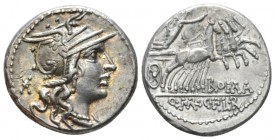 Q. Marcius, C. Fabius and L. Roscius Denarius circa 118 or 117, AR 19.2mm., 3.91g. Helmeted head of Roma r.; behind, *. Rev. Victory in prancing quadr...