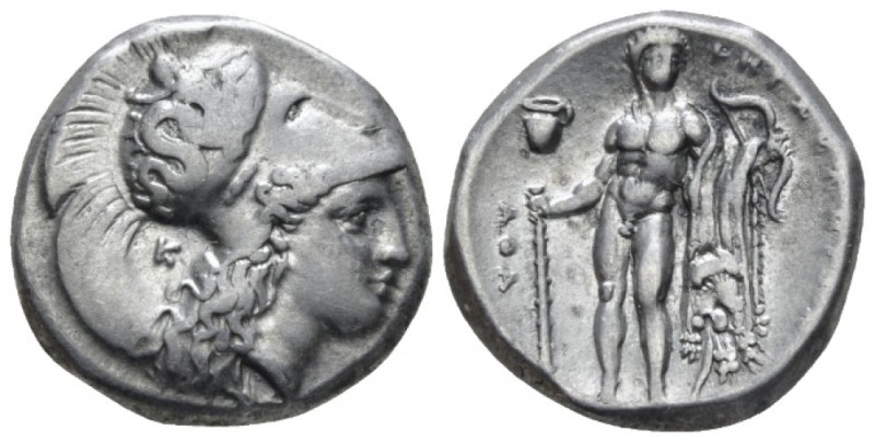 Lucania, Heraklea Nomos circa 330-320, AR 20mm., 7.94g. Head of Athena r., weari...
