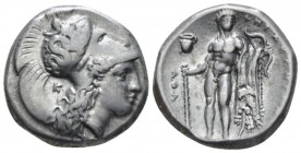 Lucania, Heraklea Nomos circa 330-320, AR 20mm., 7.94g. Head of Athena r., wearing helmet decorated with Scylla hurling stone; behind neck, K. Rev. He...