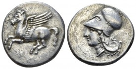 Bruttium, Medma Stater circa 330-317, AR 23mm., 8.41g. Pegasus flying l. Rev. Head of Athena l., wearing Corinthian helmet; tiny M below neck. Gorini,...