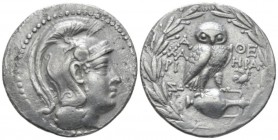 Attica, Athens New style tetradrachm circa 146-145 BC, AR 33mm., 15.88g. Helmeted head of Athena r. Rev. Owl standing r., head facing, on amphora; in ...