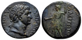 Cilicia, Laerte Trajan, 98-117 Bronze circa, Æ 21.8mm., 6.76g. Laureate head r. Rev. Apollo Sidetes wearing short chiton and chlamys, standing, l., ho...