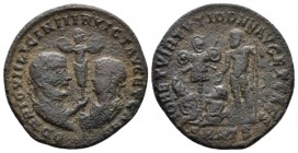 Licinius I with Licinius II Caesar, 308-324. Follis Antioch circa 320-321, Æ 21.5mm., 3.g. Half-length laureate busts of Licinius I r., and Licinius I...