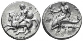 Calabria, Tarentum Nomos circa 281-270, AR 22mm., 7.66g. Rider l., holding spear and shield, dismounting from horse. Rev. Dolphin rider l., holding ba...