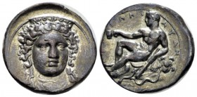 Bruttium, Croton Nomos circa 380-350, AR 24mm., 7.60g. Head of Hera Lacinia facing, wearing decorated stephane. Rev. Young Heracles seated l. on lion'...