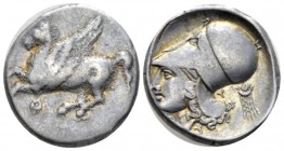 Acarnania, Thyrrenium Stater circa 350-300, AR 22mm., 8.46g. Pegasus flying l. Rev. Helmeted head of Athena l.; behind, Y and earring with pendants. C...