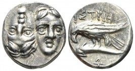 Thrace, Istros Drachm circa 380-280, AR 18mm., 5.75g. Facing male heads, the l. inverted. Rev. Sea-eagle flying l., grasping dolphin with talons; belo...