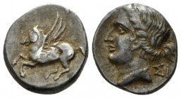 Corinthia, Corinth Drachm circa 350-300, AR 14mm., 2.54g. Pegasus flying l. Rev. Head of Aphrodite l. BMC 16. BCD Corinth 167.

Old cabinet tone, Ve...
