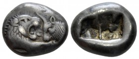 Lydia, Time of Croesus and later circa 560-520. Sardis Siglos circa 560-520, AR 16mm., 5.36g. Confronted foreparts of lion and bull. Rev. Two incuse s...