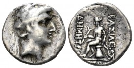 The Seleucid Kings, Demetrius I Soter, 162-150 BC Ekbatana Drachm circa 162-150, AR 16mm., 3.63g. Diademed head r. Rev. Apollo Delphios seated l. on o...
