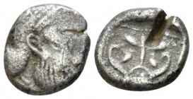 Arabia, Philistia drachm Mid V cent.-333, AR 13mm., 2.71g. Bearded head r. Rev. Paradise flower-Phoenician palmettae; two birds within volutes; below,...