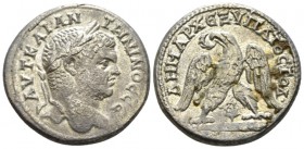 Caracalla, 198-217 Tetradrachm Tyre (Phoenicia) circa 213-217, AR 27mm., 13.22g. Laureate bust r. Rev. Eagle standing with wings spread, head l., on c...