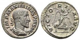 Maximinus I, 235-238 Denarius circa 235-236, AR 20mm., 3.40g. Laureate, draped and cuirassed bust r. Rev. Victory advancing r. holding wreath and palm...
